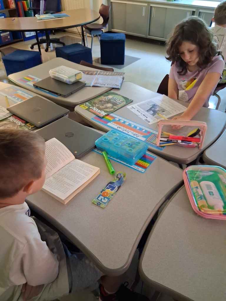 Students read at their seats 