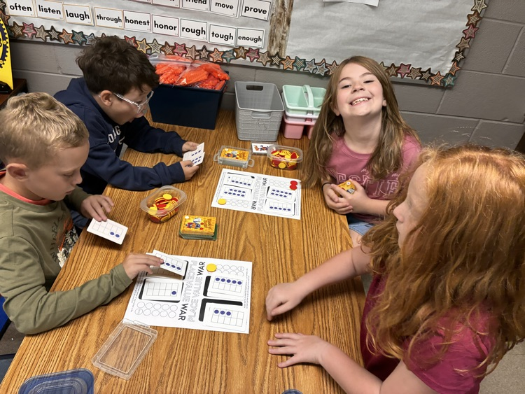 Students playing a learning math game. 