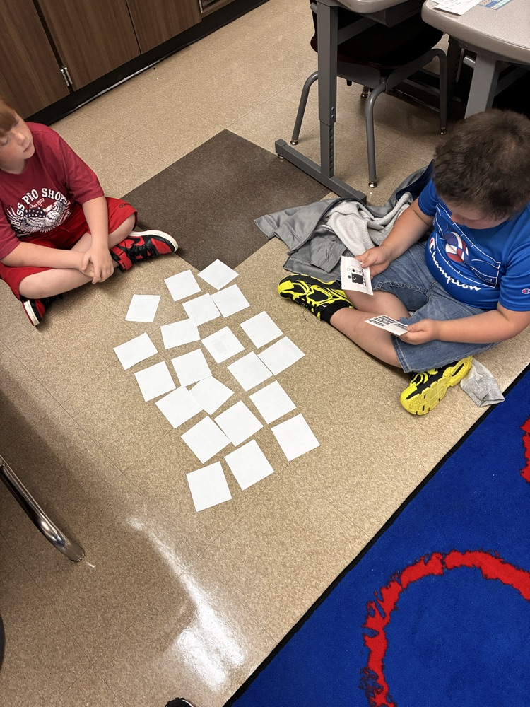 Students playing a learning math game. 