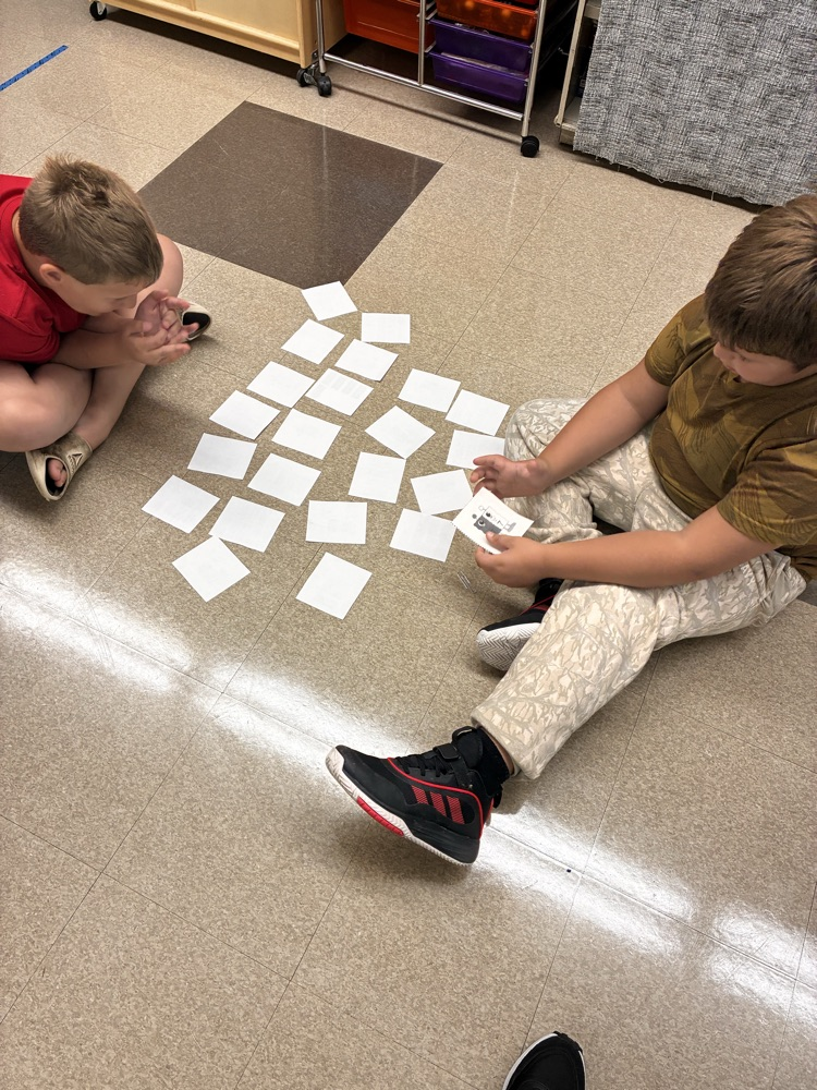 Students playing a learning math game. 