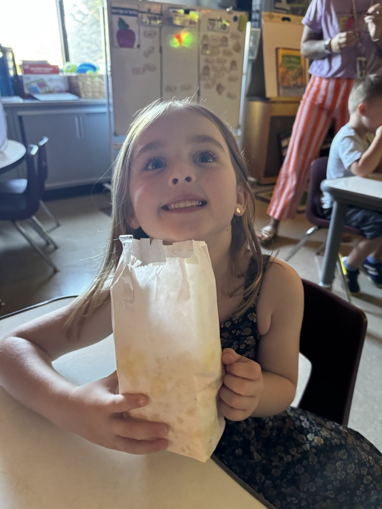students enjoying popcorn
