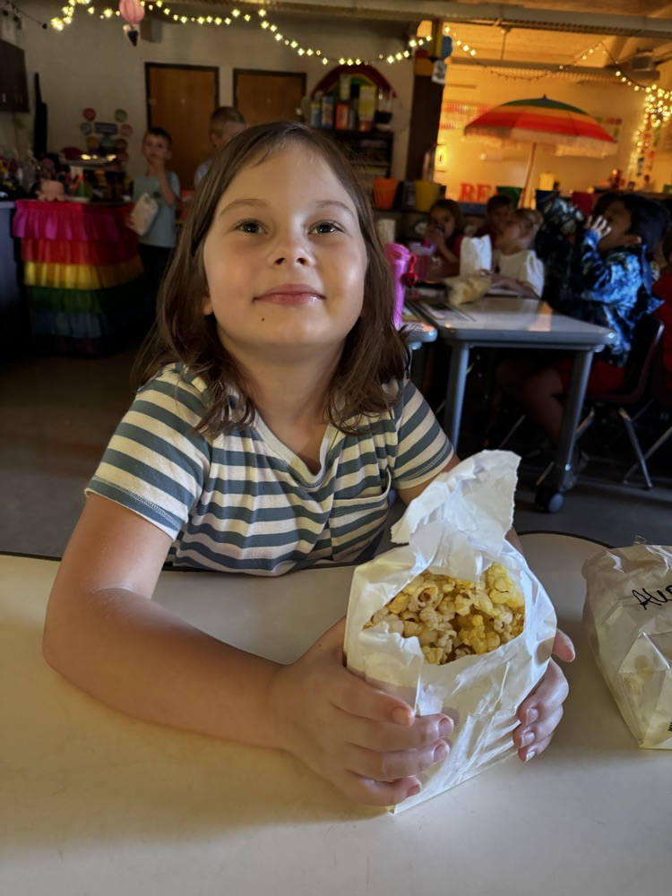 students enjoying popcorn