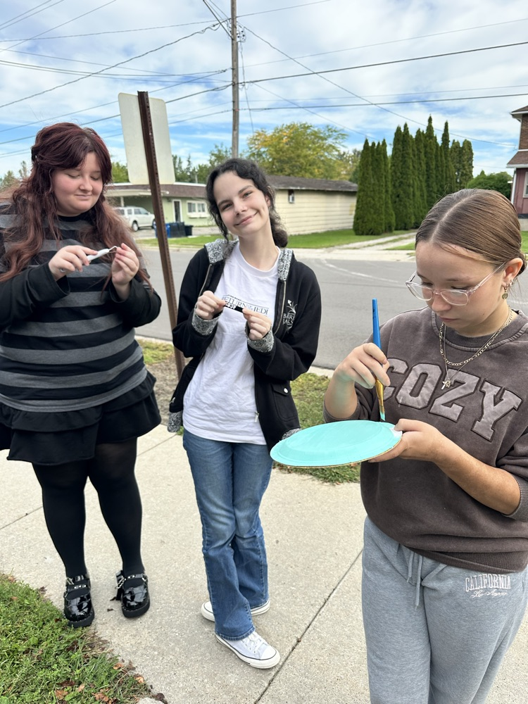 dedicated students working outside 
