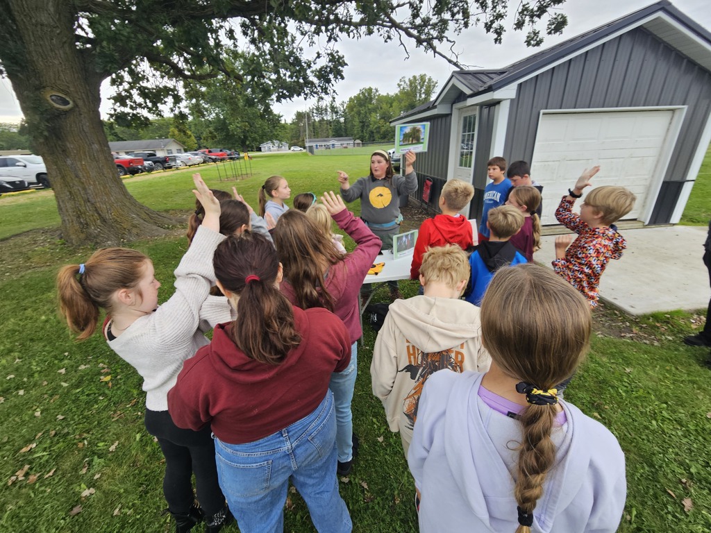 students asking questions at outdoor learning center