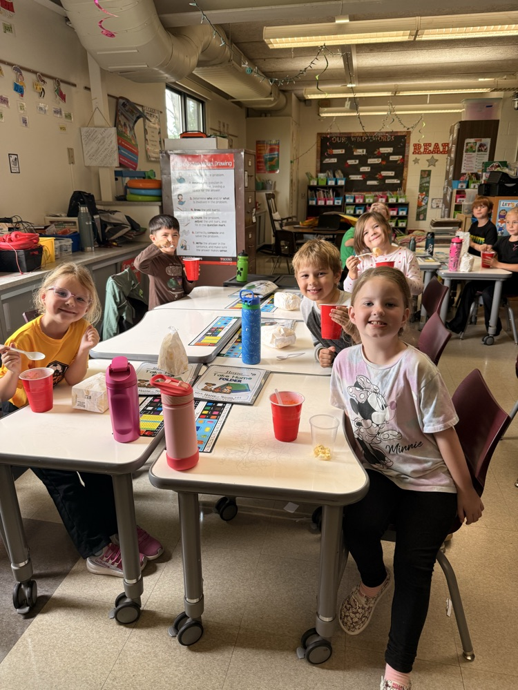 students enjoying a treat for positive behavior 