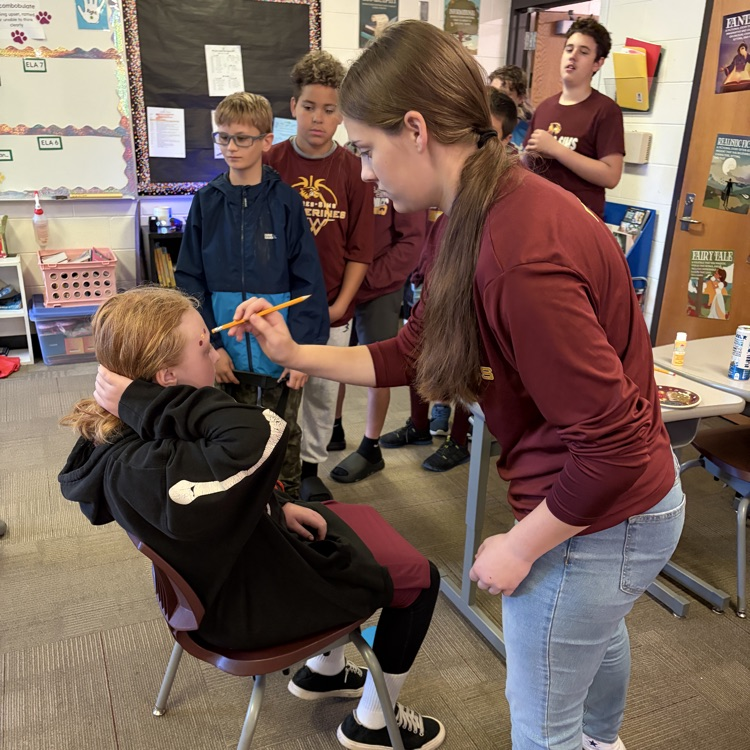 High school student face painting