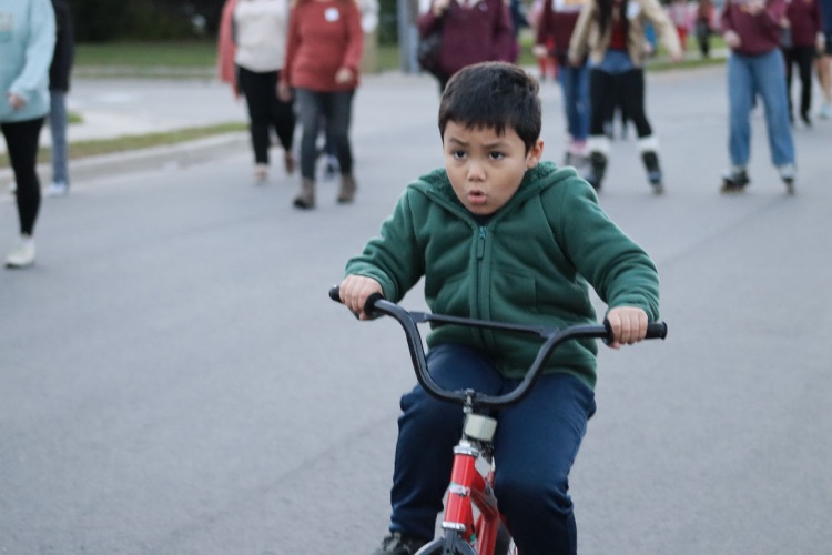 kid riding on bike