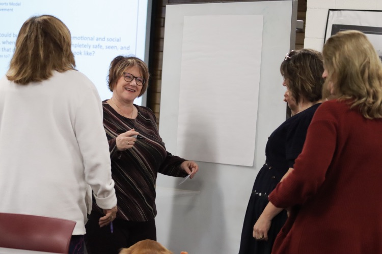 teachers talking and brainstorming