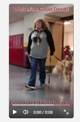 person walking a dog in a hallway