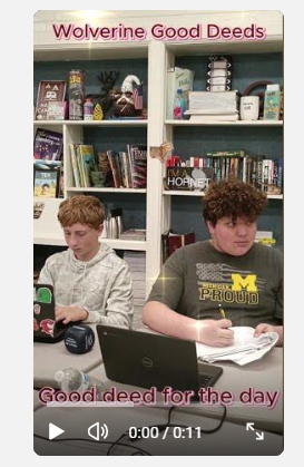 students sitting in desks writing notes