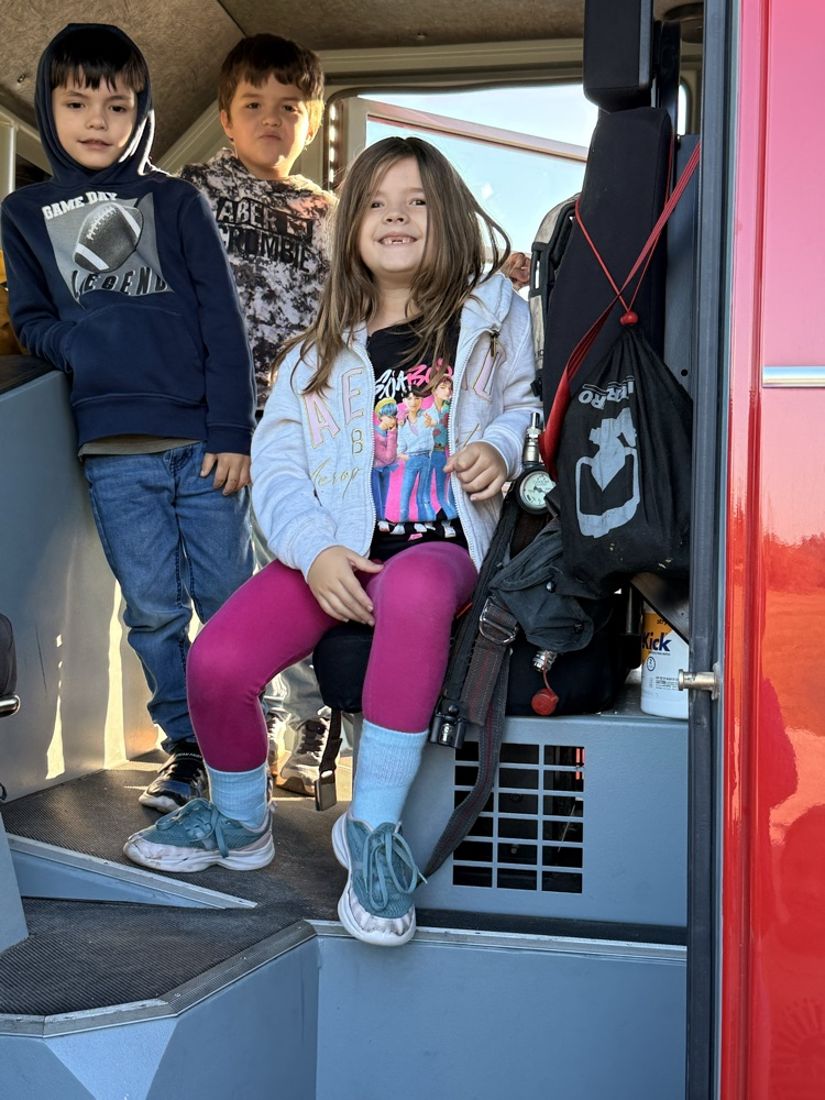 student in fire truck