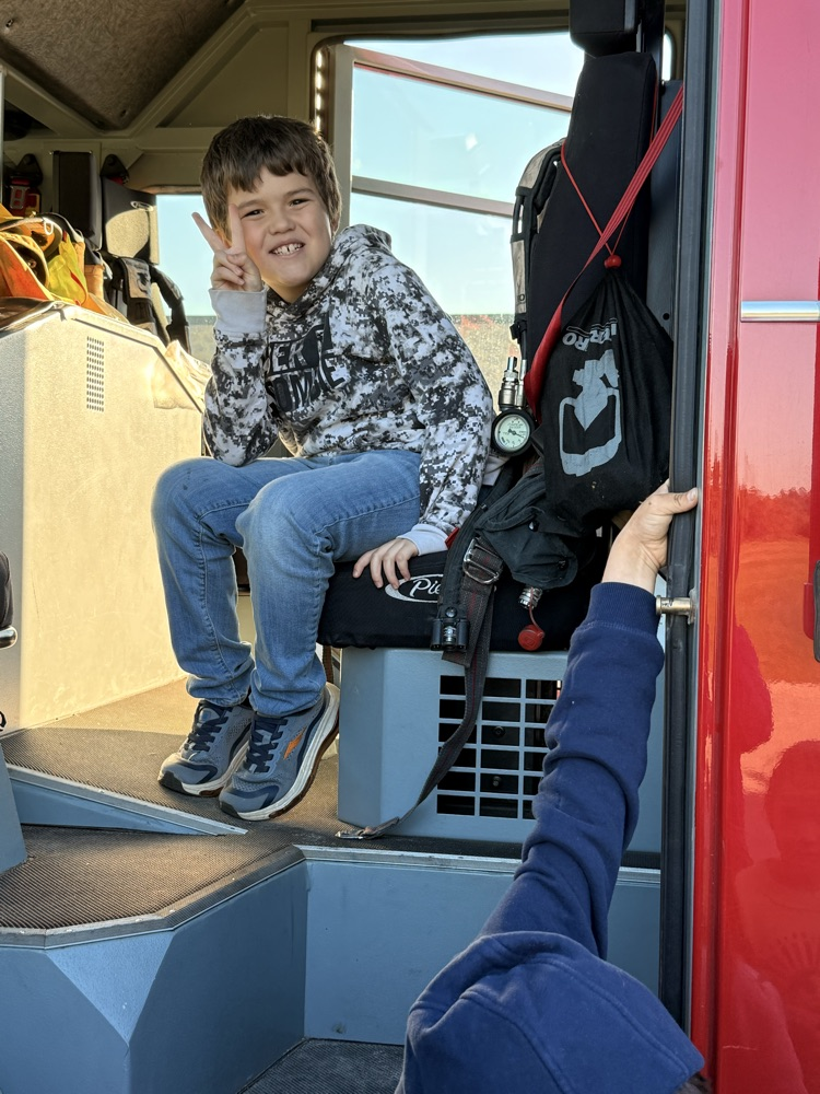 student in firetruck