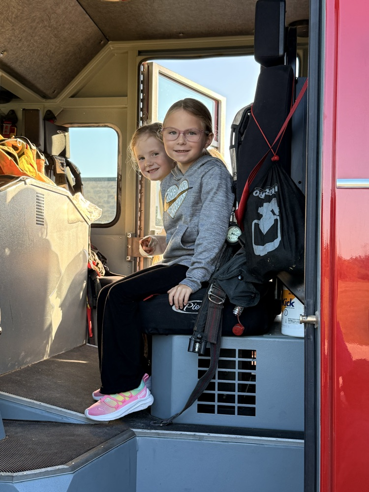 student in firetruck