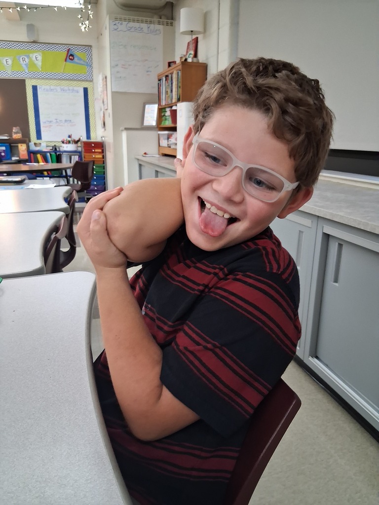 kids trying to lick elbows