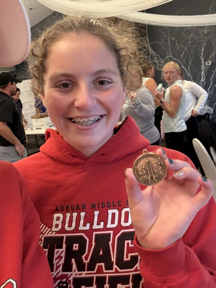 Char and her medal