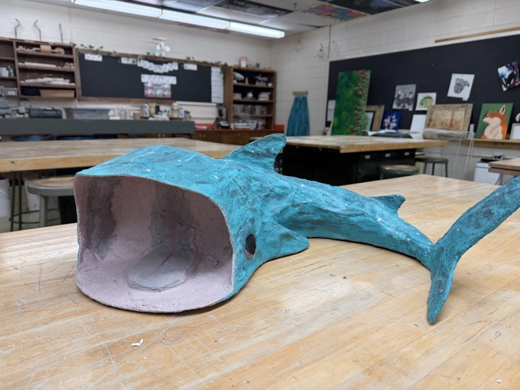 Plaster sculpture by Marc Bohling titled “Tiny”receiving a third place ribbon