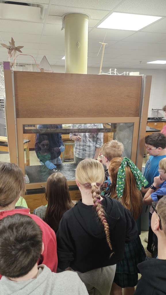 Students around the hood for safety.