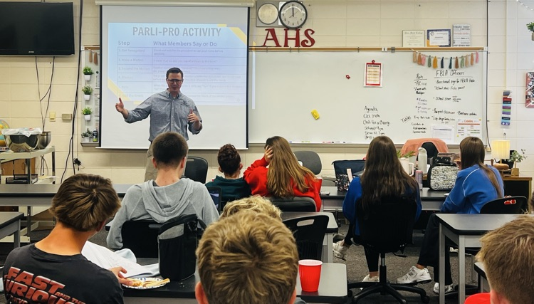 Dr. Crotty speaking to members  