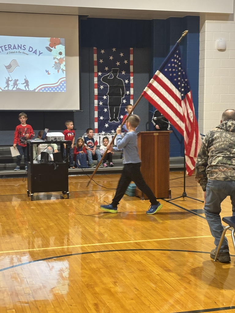 North River Elementary Veterans Day Ceremony Student Holding the US Flag