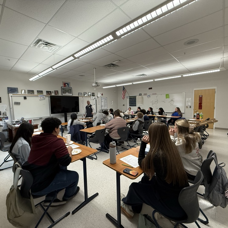 Superintendent Tracy with students