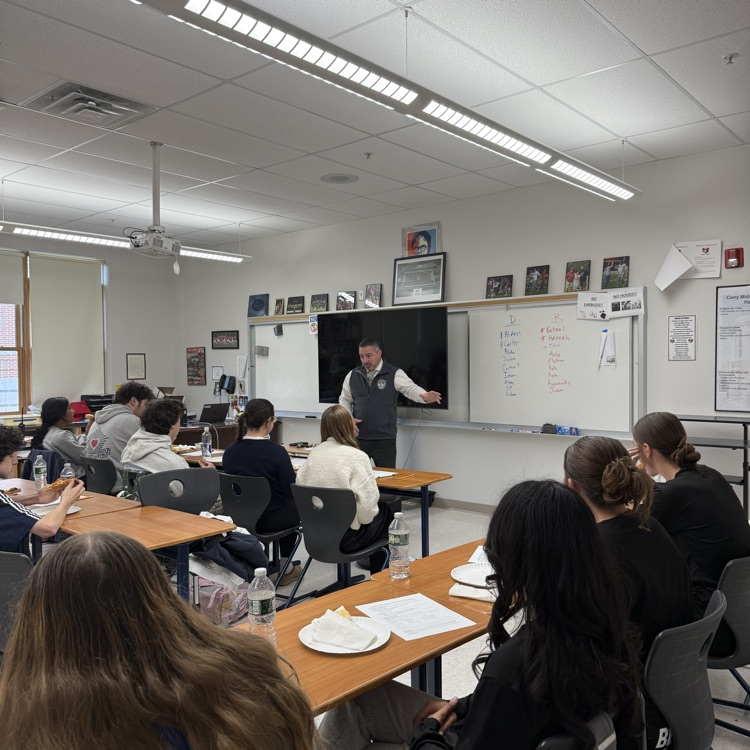 Superintendent Tracy with students