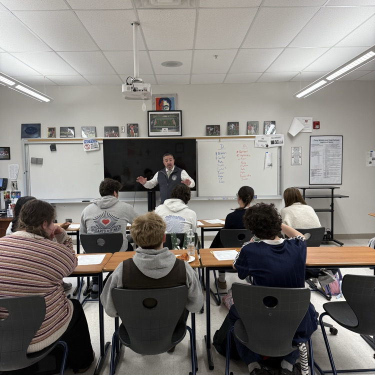 Superintendent Tracy with students