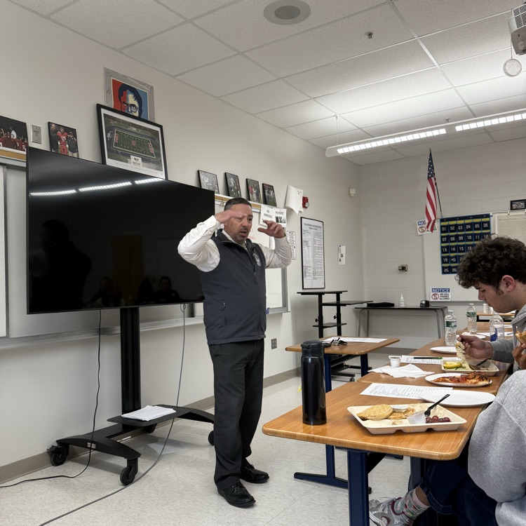 Superintendent Tracy with students