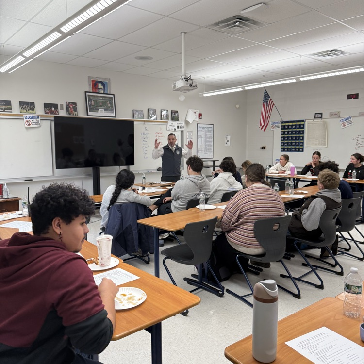 Superintendent Tracy with students