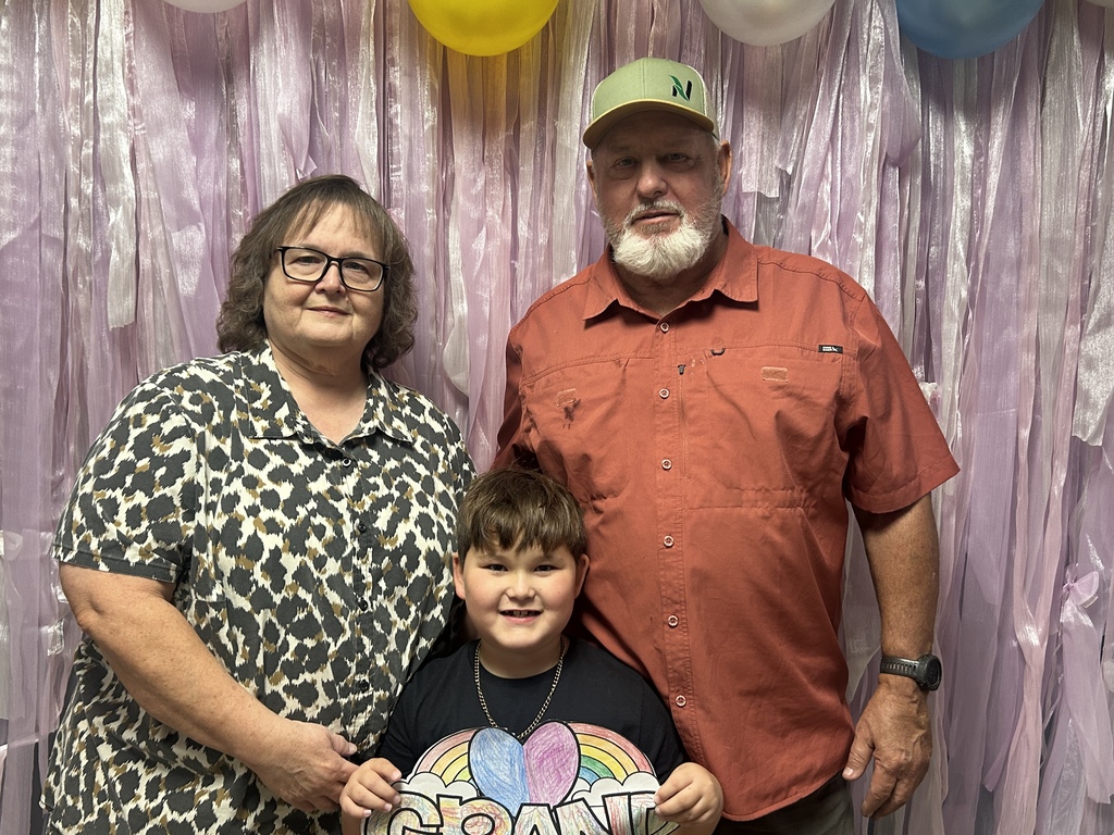 Student and grandparents