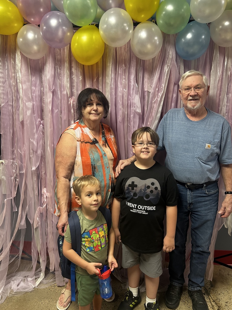 Student and grandparents