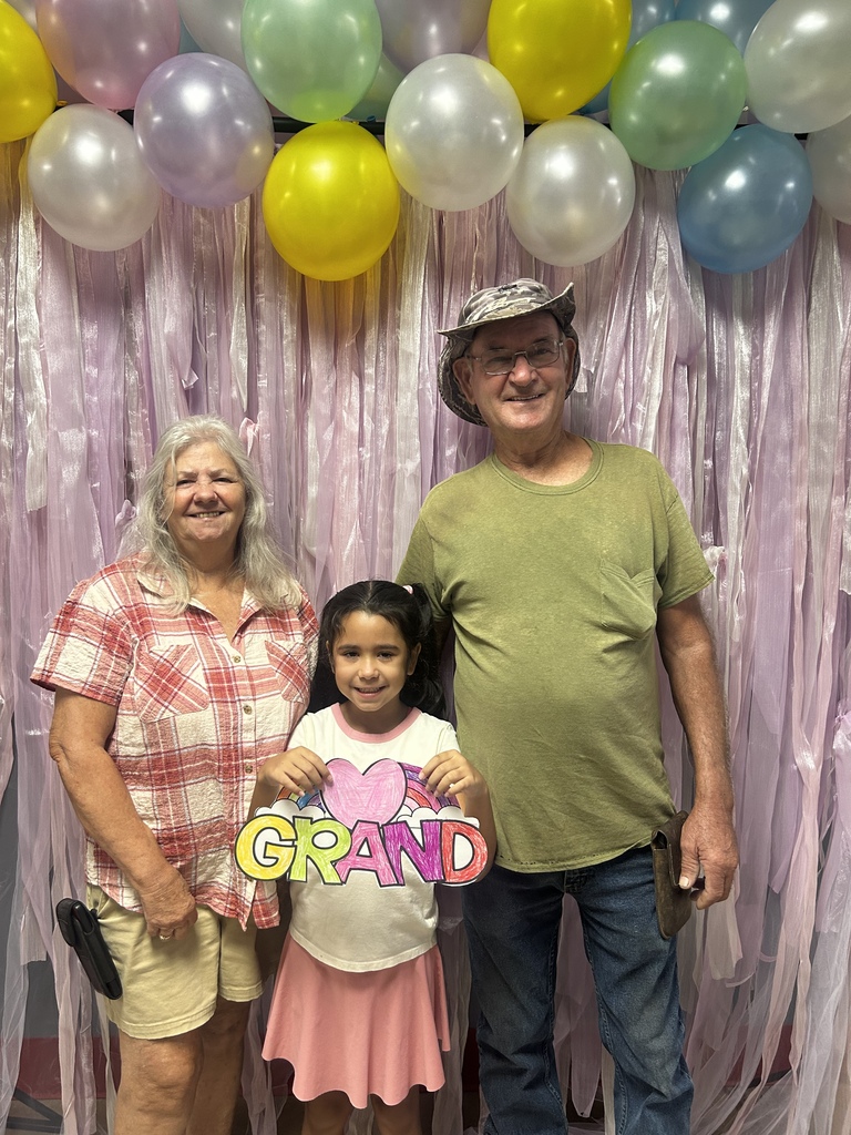 Student and grandparents