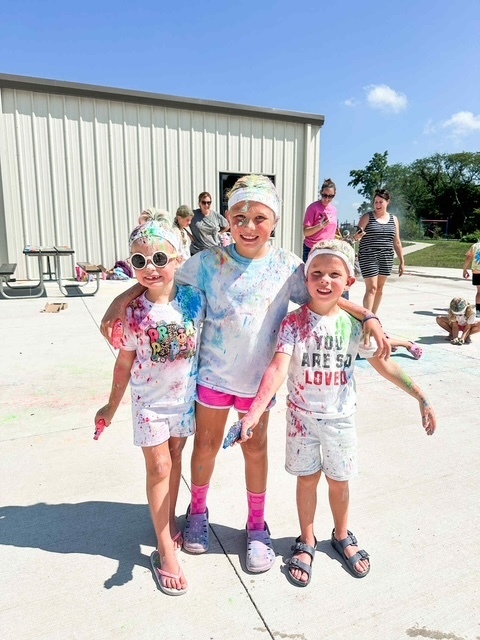 Students sprinkled iwth color. 