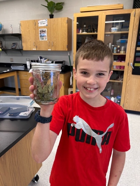 student with chrysalis