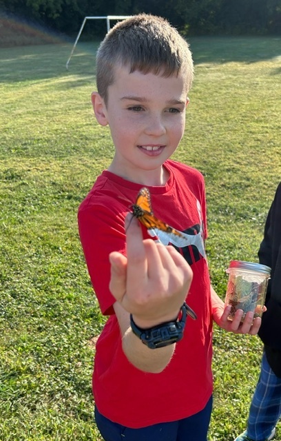 student with butterfly 