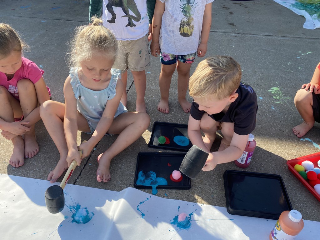 students painting