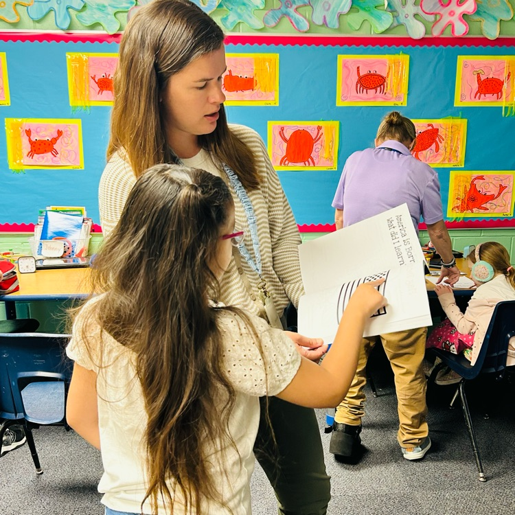 teacher with book