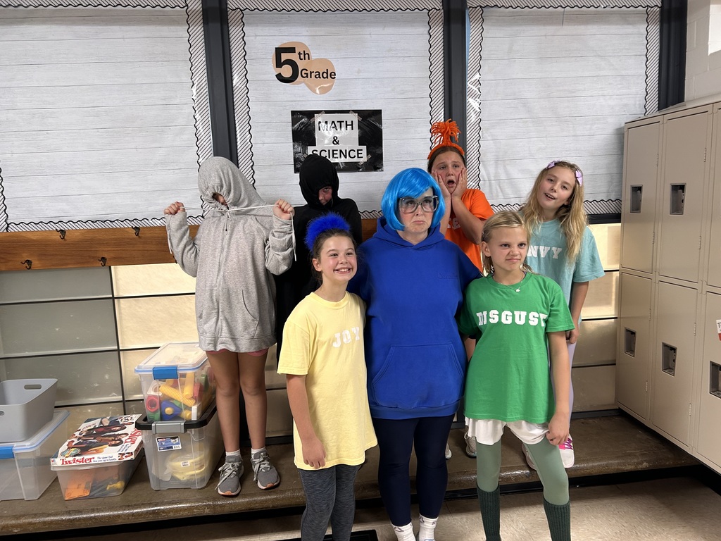 Mrs. Meza and some 5th grade girls as characters from the Inside Out movie