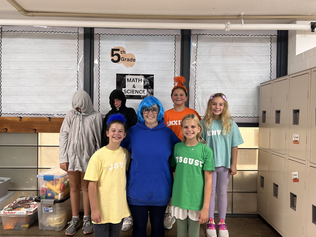 Mrs. Meza and some 5th grade girls as characters from the Inside Out movie