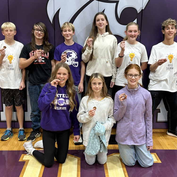 junior high team posing with their medals
