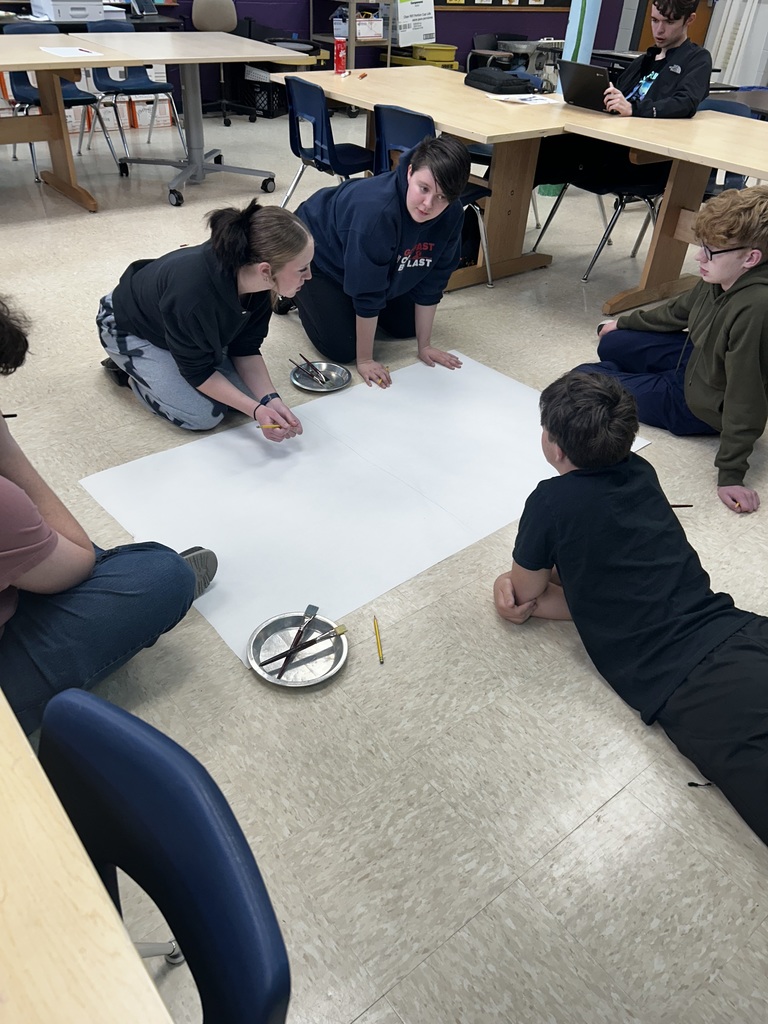 Students discuss the topic of "Legacy" and work on sketching out their ideas