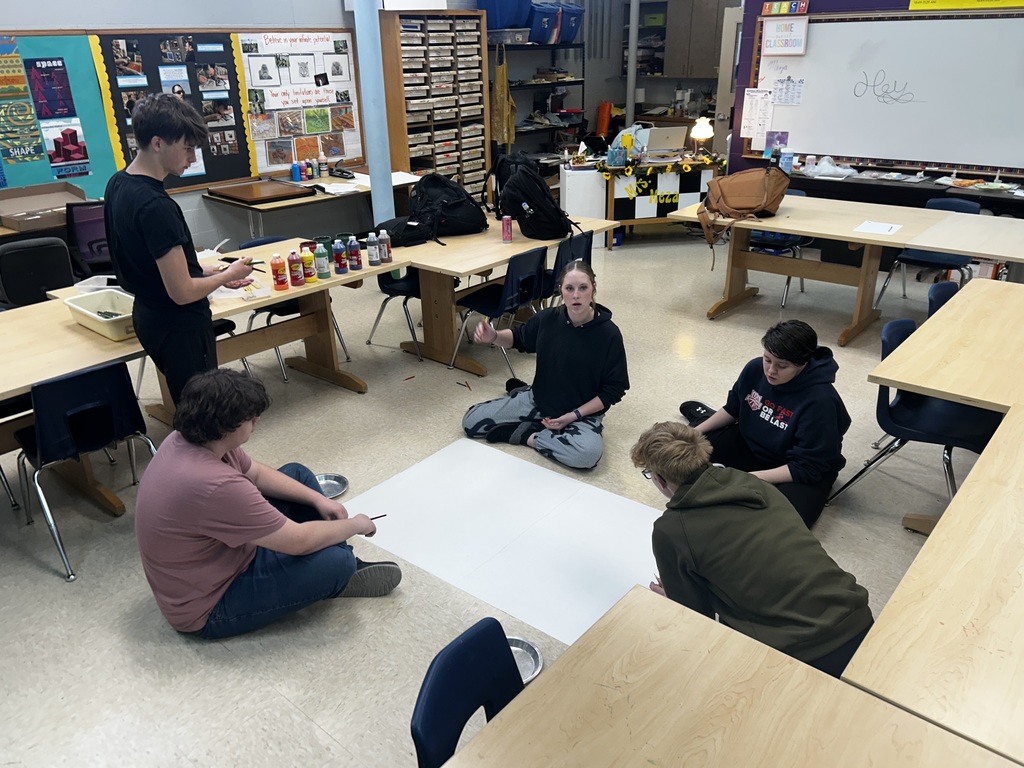 Students discuss the topic of "Legacy" and work on sketching out their ideas