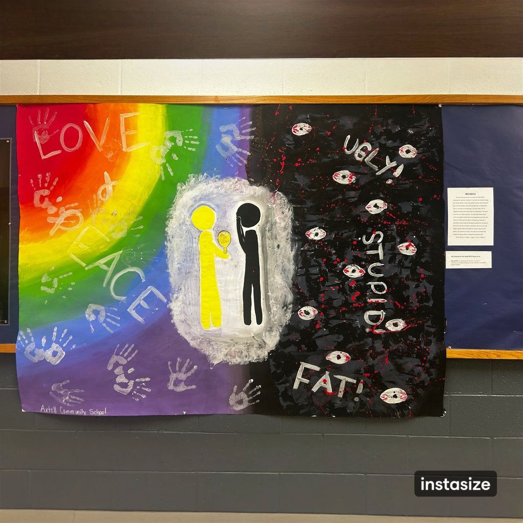 The finished painting hanging in the Art hallway at school