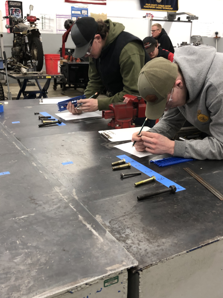 Keagan French, Levi Ankney, and Wyatt Price competed in the FFA District 1 Outdoor Power Equipment contest.