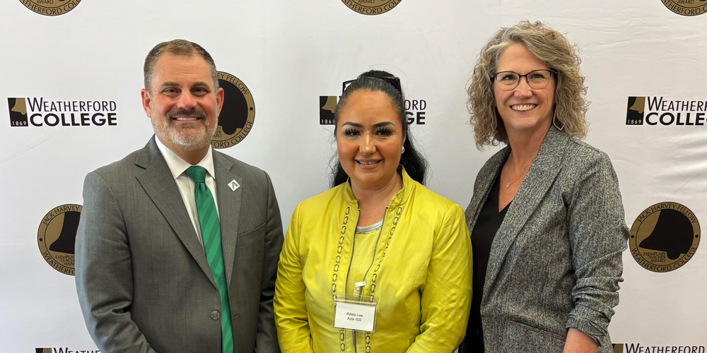 Todd Smith, Adela Lee, Shelley Newton standing in front of Weatherford College backdrop