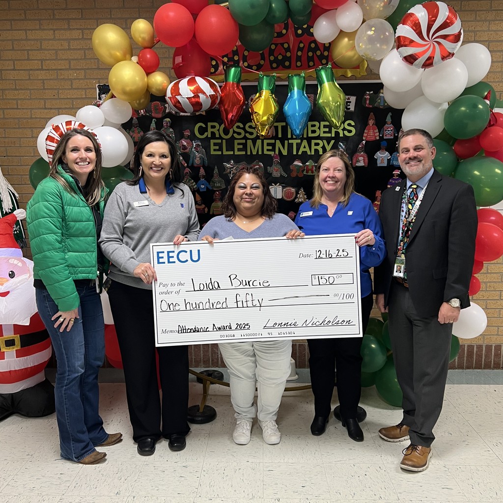2025 EECU Attendance Award (lady holding large check)