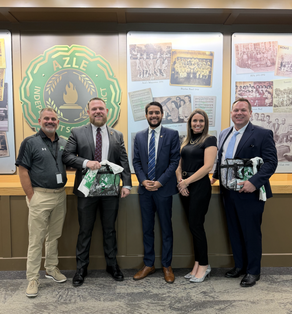 Azle administration standing with members of the Texas Senate District 9