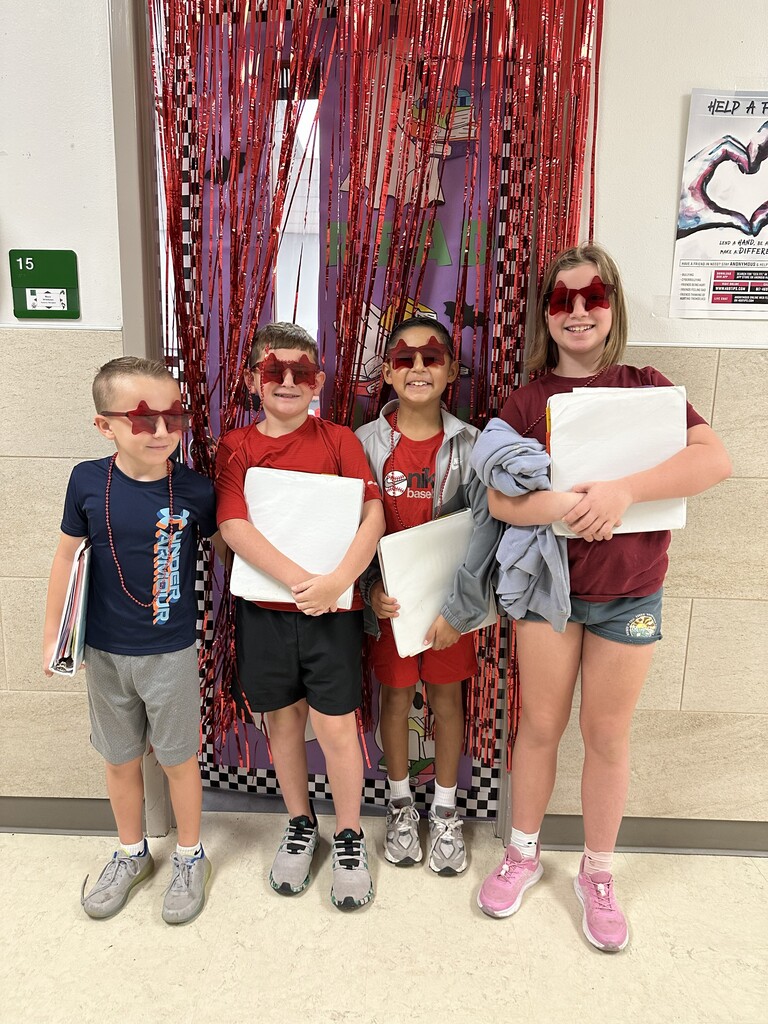 picture of students with red star sun glasses