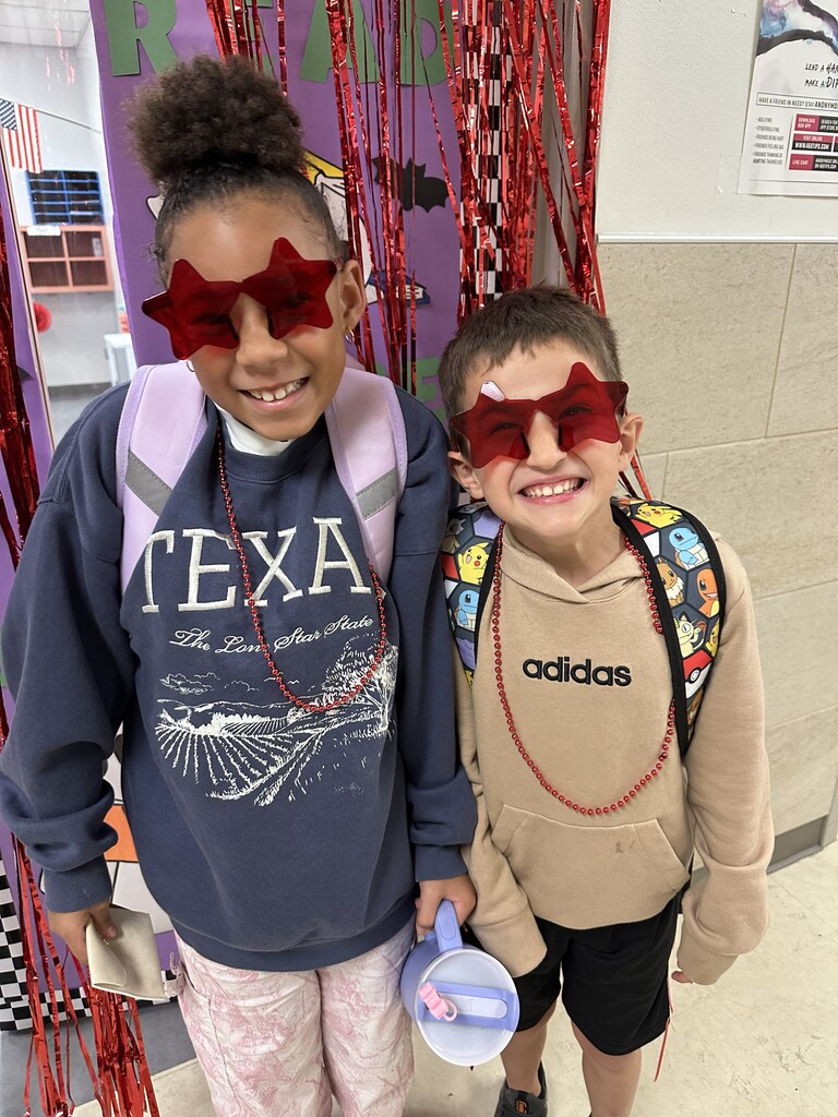 picture of students with red star sun glasses