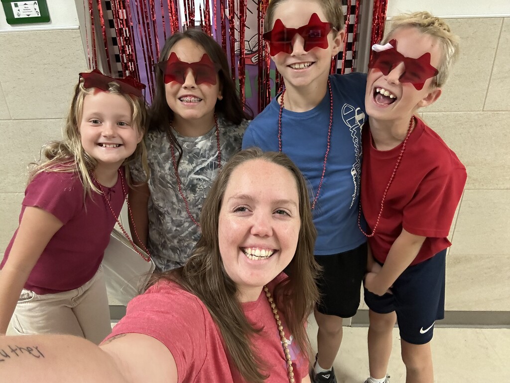 picture of students with red star sun glasses