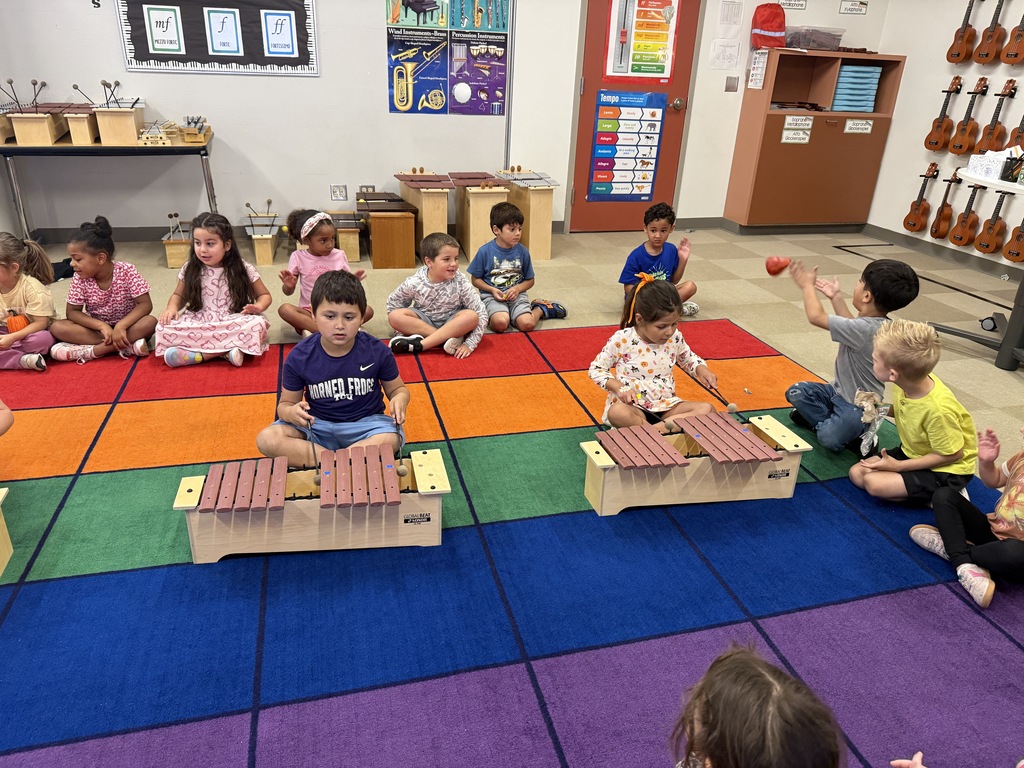 Image of students playing xylophones